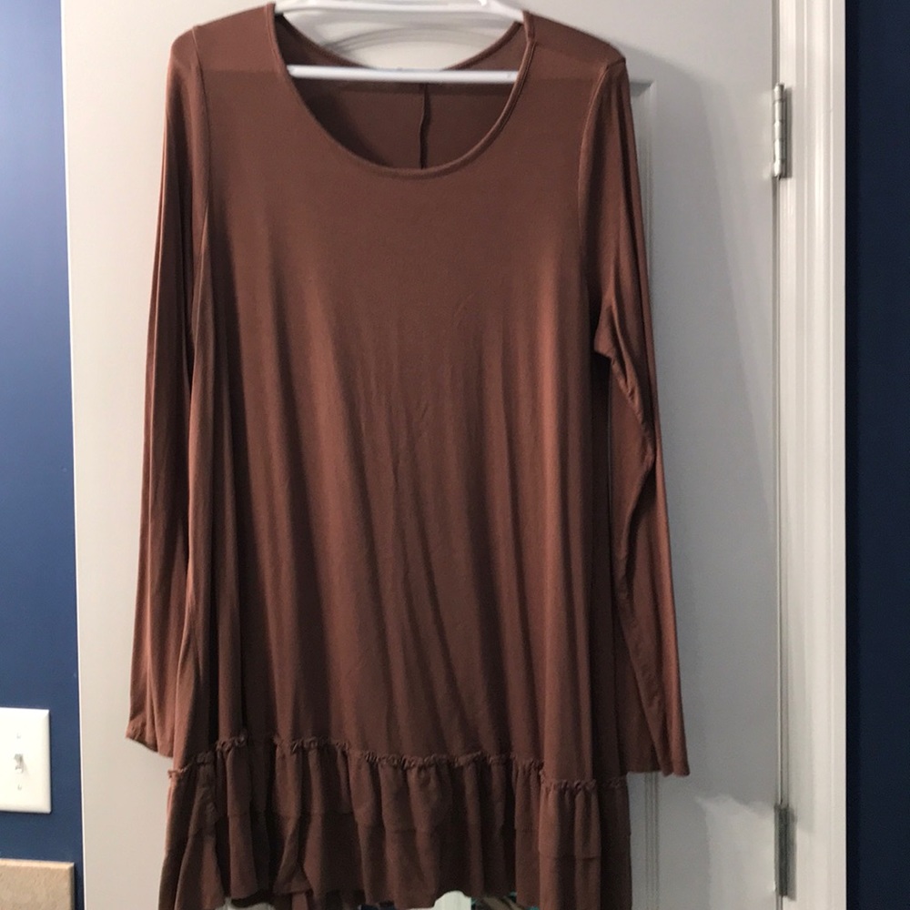 Long sleeve ruffle bottom tunic